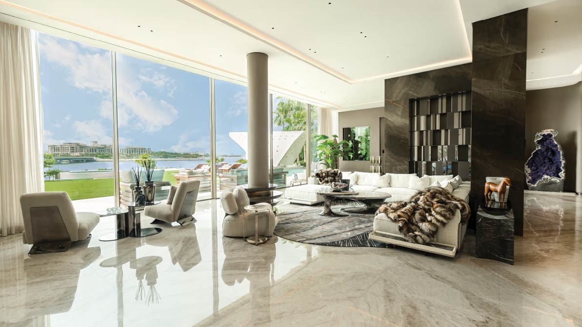 Living hall of the Bvlgari Mansion, marble floor, glass wall onto the bay